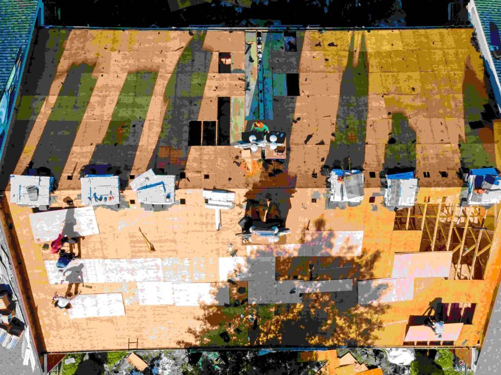 In order to repair roof of an apartment building, new shingles were installed and plywood was installed to replace old ones